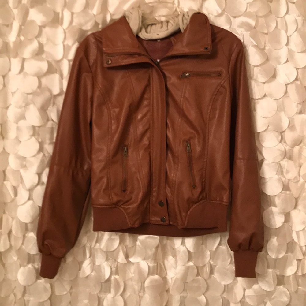 Jacket with removable knit style hood